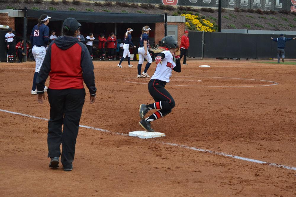Macauley Prickett rounds first base against the University of Virginia on Friday, Mar. 17, 2017 in Dail Stadium. Prickett helped the Wolfpack defeat Virginia with a score of 10-3.