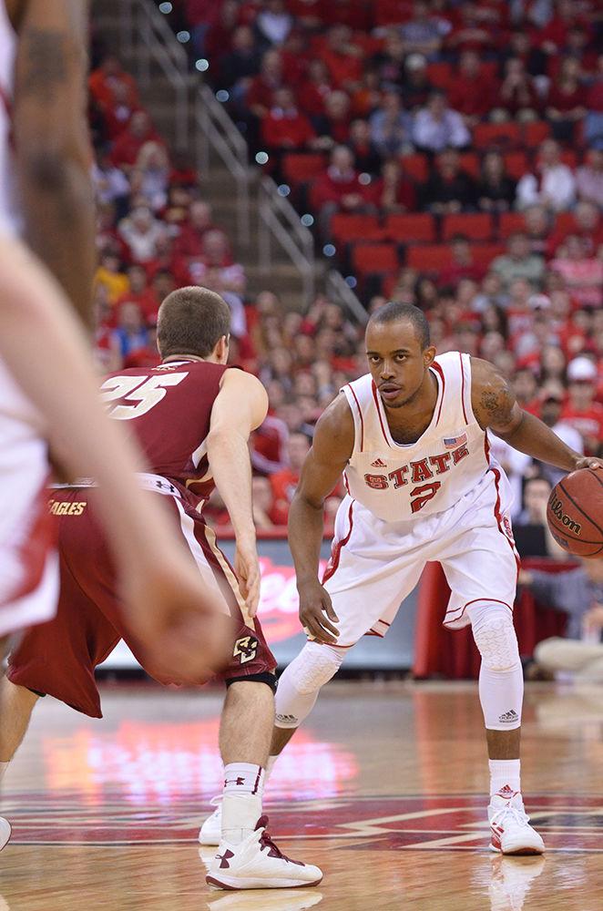 Then-junior guard Lorenzo Brown stares down the defense during the game against Boston College in PNC Arena Feb. 27, 2013. The Wolfpack defeated the Eagles 82-64, for a total of 20 wins on the season.