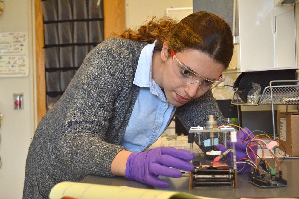 Hanan* "Alex" Hsain, a junior studying materials science and engineering, sets up an experiment in her lab in Engineering Building I on Centennial Campus on Monday. Hsain was a recipient of the 2017 Truman Scholarship. "My current work on reverse electrowetting energy harvesting aims to offset our carbon footprint by harnessing energy from ambient vibrations. The Truman Scholarship will aid me furthering our energy independence through energy research, which I hope to pursue in grad school," Hsain said.
*Editor's note: this caption originally misspelled Hsain's first name.