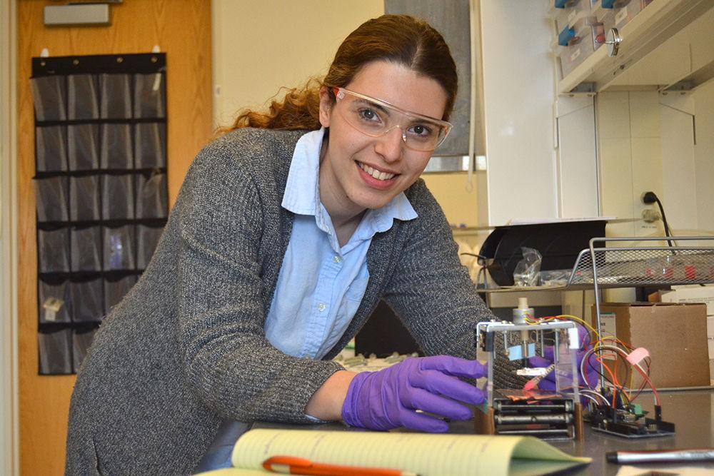 Hanan* "Alex" Hsain, a junior studying materials science and engineering, sets up an experiment in her lab in Engineering Building I on Centennial Campus on Monday. Hsain was a recipient of the 2017 Truman Scholarship. "My current work on reverse electrowetting energy harvesting aims to offset our carbon footprint by harnessing energy from ambient vibrations. The Truman Scholarship will aid me furthering our energy independence through energy research, which I hope to pursue in grad school," Hsain said.
*Editor's note: this caption originally misspelled Hsain's first name.