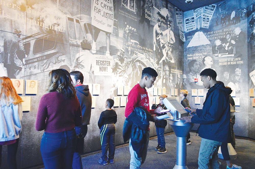 Attendees of the trip explore the Civil Rights Memorial Center in Montgomery, Alabama. The center was established in honor of 40 people who died as a result of their involvement in the civil rights movement.