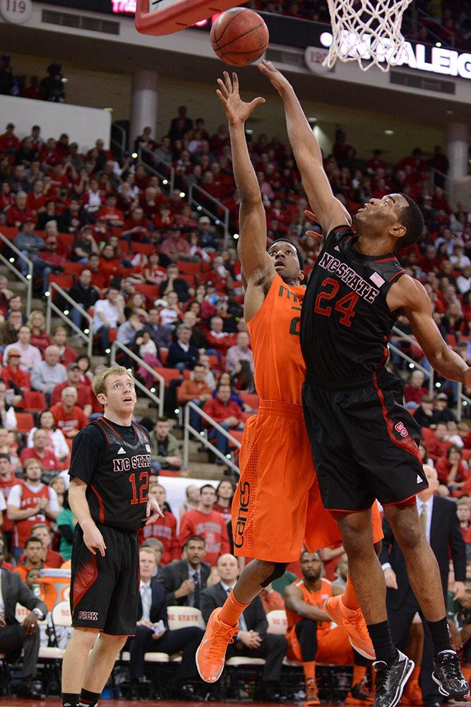 Then-sophomore forward T.J. Warren reaches for a rebound during the game against Miami in PNC Arena March 1, 2014. The Wolfpack fell to the Hurricanes, 85-70.&#160;