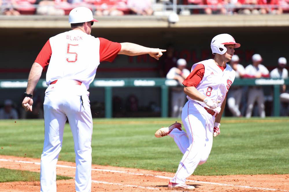 Freshman second baseman Will Wilson rounds first towards second base after hitting a line drive through the infield in the Wolfpack's game against Florida State on April 9, 2017. Wilson ran for a double on the play and had 2 hits and 2 RBIs in the 8-4 win at Doak Field.