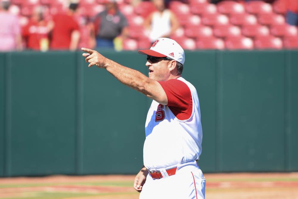 Head coach Elliott Avent waves to the crowd as he walks back to the dugout after the Wolfpack beat Florida State 8-4 on April 9, 2017 at Doak Field.