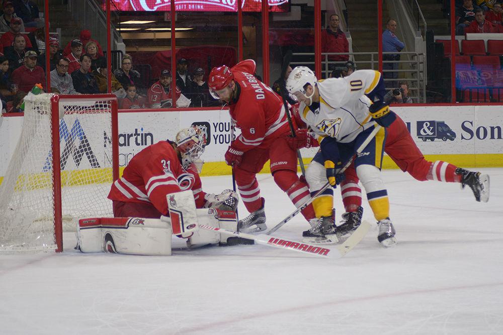 Hurricanes goalie Eddie Lack stops a shot from Predators forward Colton Sissons in the first period. Lack faced 29 shots in the Canes 4-2 victory over Nashville in PNC Arena on Saturday.