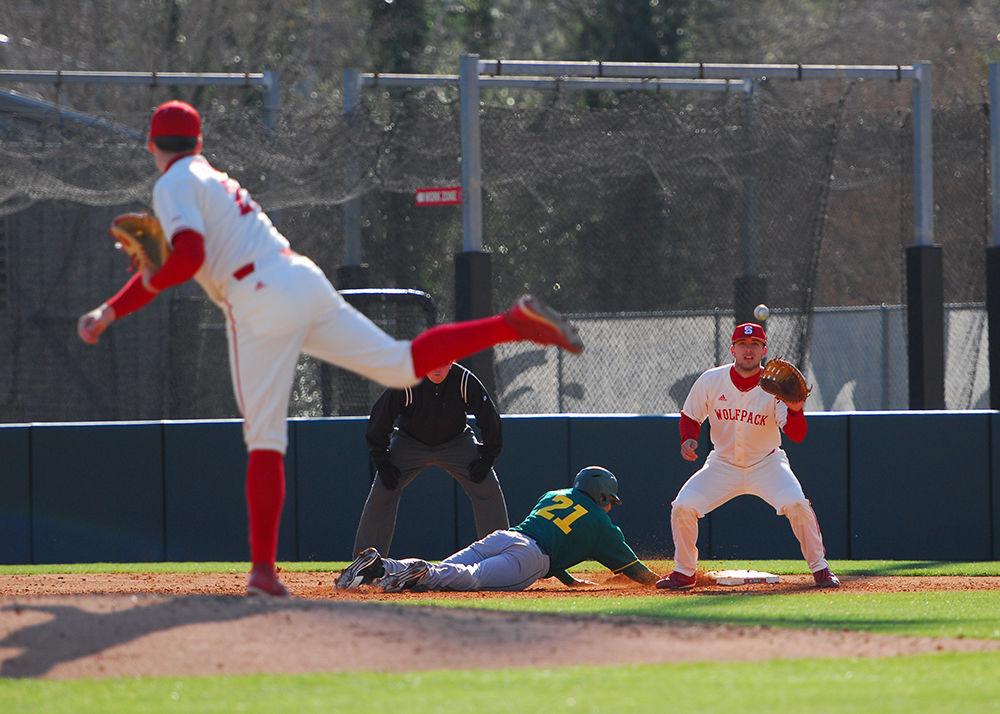 First baseman Shane Shepard catches a ball from pitcher Michael Bienlien as George Mason&#8217;s Brady Acker attempts to steal a base on March 15. NC State began the afternoon with a 5-1 lead in the first inning, keeping its lead until the game's conclusion. The game ended with a 7-3 win for the Wolfpack.