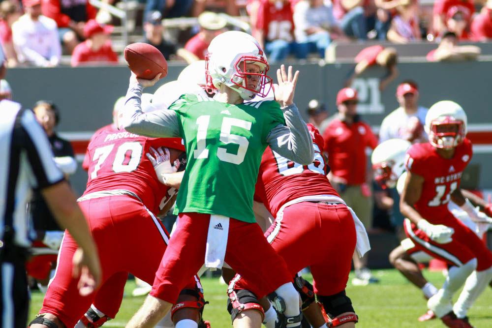 Graduate quarterback Ryan Finley winds up for a pass to the outside in the Wolfpack's Kay Yow Spring Game on Saturday at Carter-Finley Stadium. The format of this year's spring game was completely changed featuring scripted plays and no live tackling.