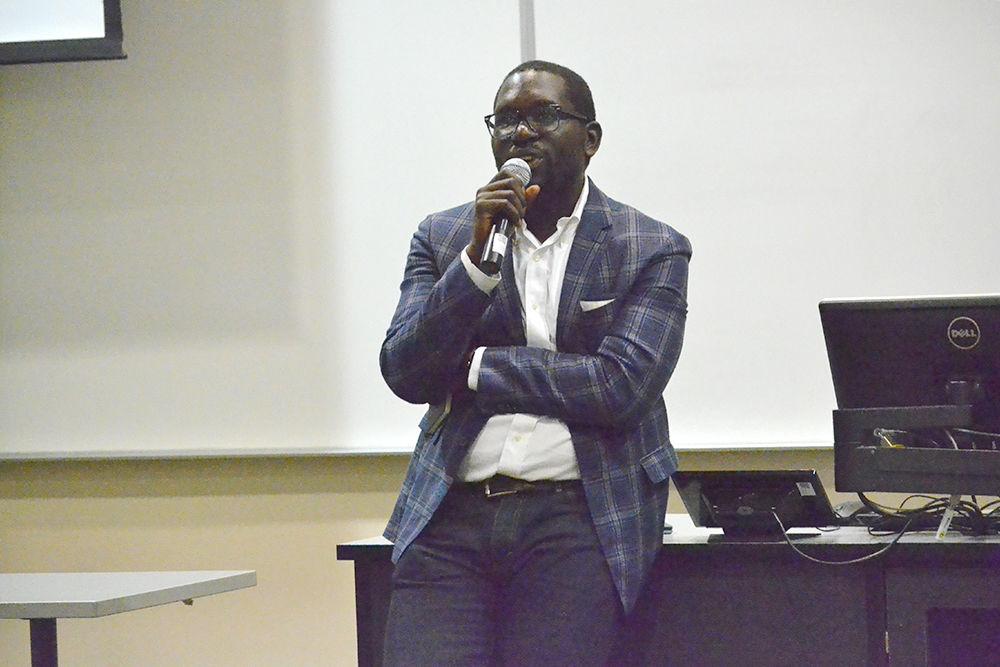 Jamelle Bouie, the chief political correspondent for Slate magazine and political analyst for CBS speaks about the Civil Rights in the Age of Trump in Withers Hall on Monday. Bouie said that the demagogue ideals of Trump are just a historical recurrence similar to those after the Redeemers after the Civil War and the platform of George Wallace in 1968.