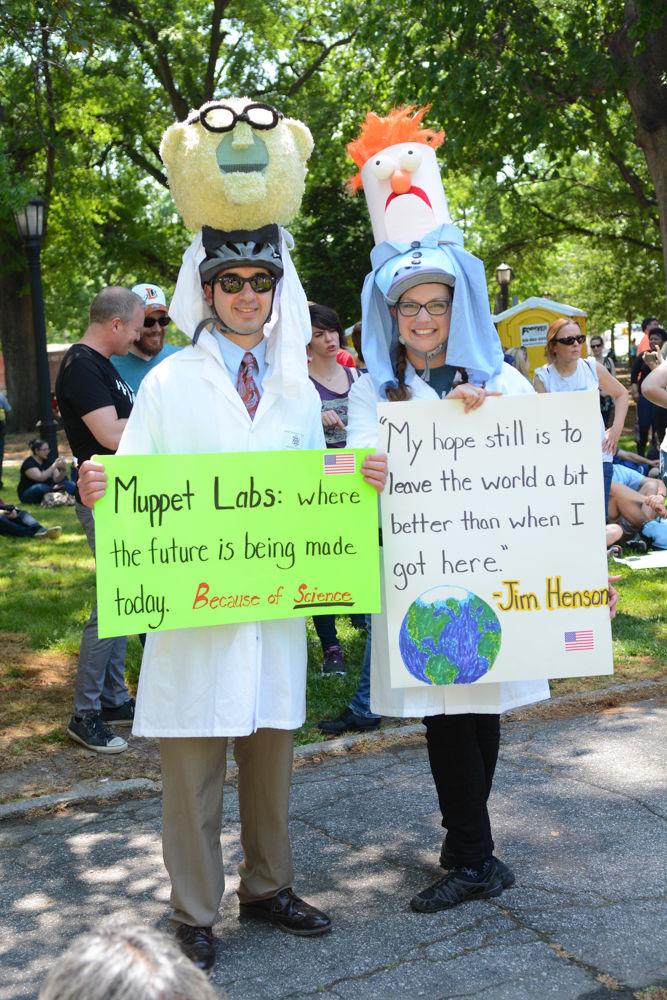 Husband and wife Phil and Teri Travisano, Chapel Hill, hold their signs while dressed as Dr. Bunsen and Beaker from the Muppets. The Travisanos were among thousands of marchers who participated in the first ever Raleigh March of Science held on April 22, 2017.