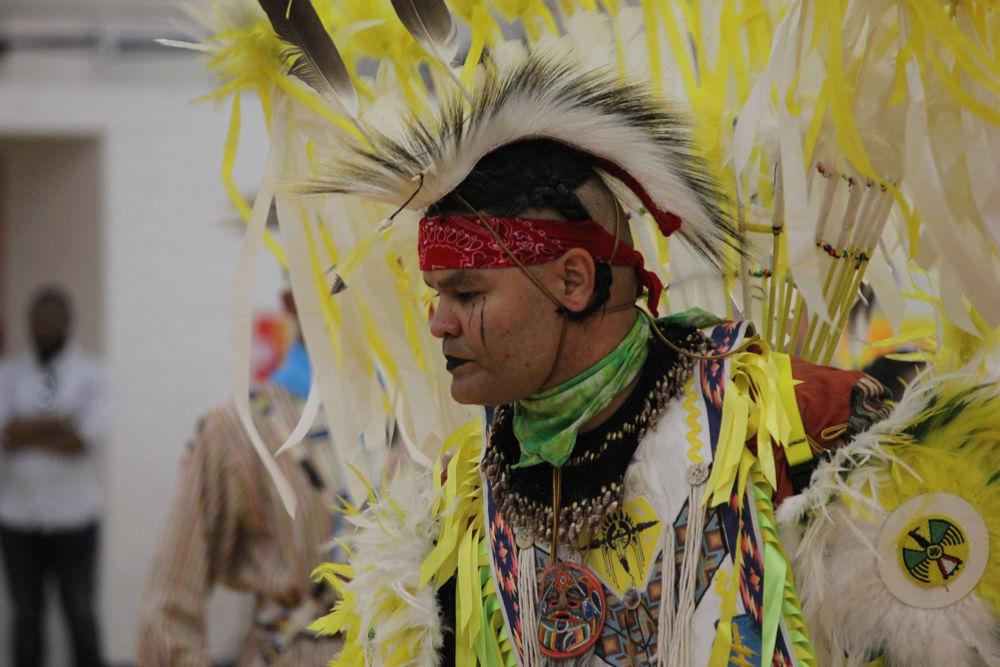 Ramon Romos of the Taino tribe participates in the dance competition during Pow-wow Saturday, April 1, 2017. The 27th annual Pow-wow is an event with dancing food, and venders that honors Native American culture. The Arena where the participants dance is purified before the competition.