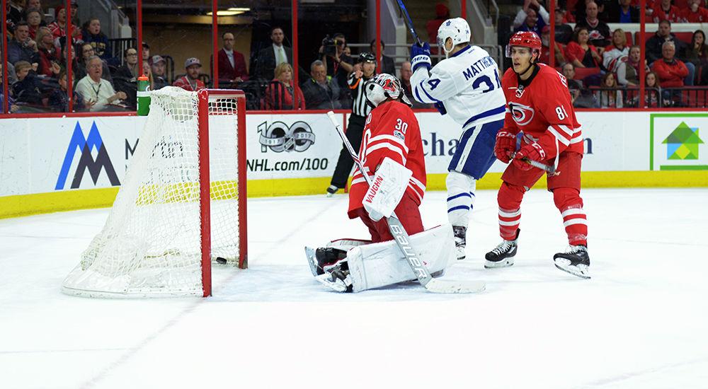 Hurricanes goalie Cam Ward is beat in overtime by a shot from Maple Leafs defender Morgan Rielly. Ward stopped 23 of 26 shots faced in the Hurricanes 3-2 overtime loss at PNC Arena on Saturday.