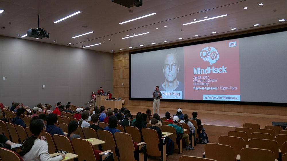 Speaker, comedian and mental health activist Frank King addresses MindHack participants and members of the public in Duke Energy Auditorium in Hunt Library. &#160;