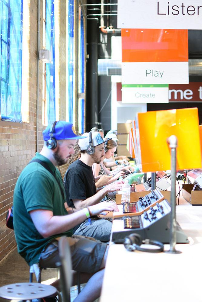 Moogfest attendees sample different Moog products during the festival. Moogfest spanned several venues in downtown Durham and featured more than 50 artists and installations from May 18-21.