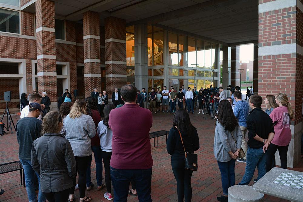 Students, faculty, friends and others gather at Engineering Building II on Centennial Campus on Monday to remember Cheyanne Hass, a senior who was studying electrical engineering, who passed away early Sunday in a car accident. During the vigil, deans of the College of Engineering spoke, friends of Hass told stories of their times together and candles were lit to celebrate the memory the bright young NC State student.