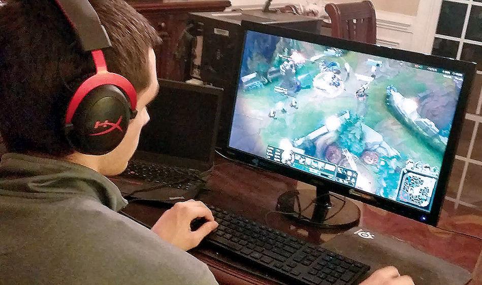 Stephen Downhower, the captain of NCSU Prime and manager/president of &#8220;League of Legends&#8221; at NC State plays &#8220;League of Legends&#8221; on his computer at home. He plays under the username &#8220;Pluckin Penguin.&#8221;