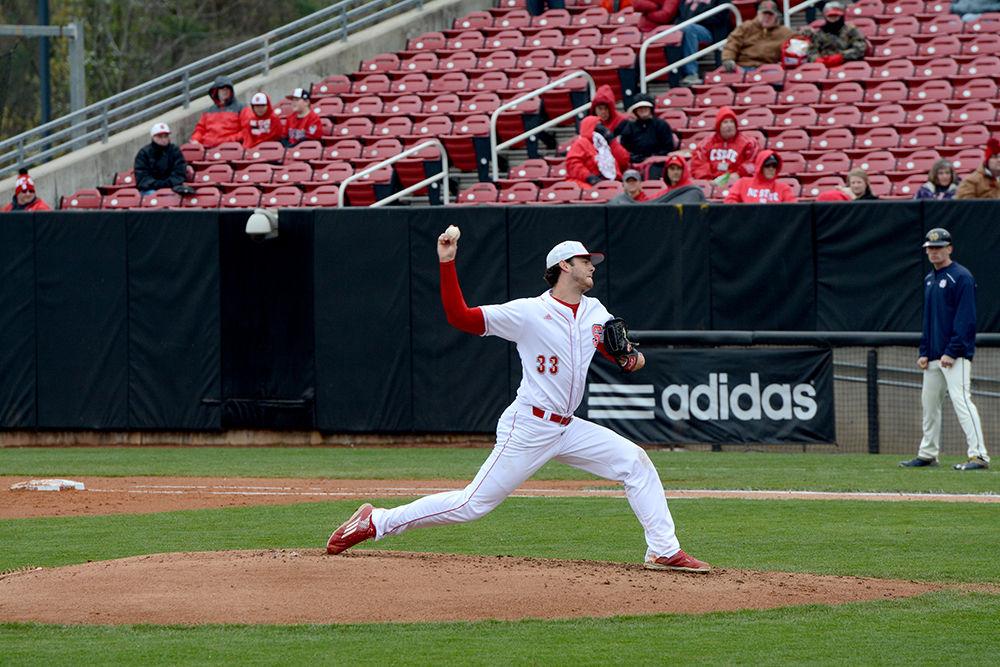 Johnny Piedmonte, a junior pitcher from Davidson, North Carolina, strikes out a Notre Dame batter with one of the many pitches he threw at the NC State Baseball game vs. Notre Dame at Doak Field on Sunday, March 20. The Pack won this ACC game 16-6, with Piedmonte pitching two total innings and only letting two Notre Dame batters walk during the course of the game.