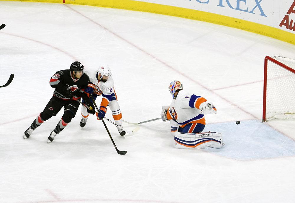 Hurricanes forward Teuvo Teravainen sneaks the puck past the Islander's goalie off an assist from Justin Faulk and Lee Stempniak. Teravainen earned one goal and one assist in the Hurricane's 7-4 victory over the Islanders on Saturday in PNC Arena.