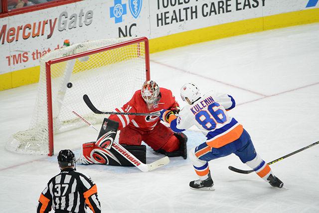 Nikolay Kulemin, Islanders left wing number 86, scores without assistance on Eddie Lack, Hurricanes goalie number 31, for an early Islanders lead, 2-0. Kulemin had a 100 percent shooting percentage for the game with one goal and one assist early on in the first period. The New York Islanders defeated the Carolina Hurricanes at home in overtime, 4-3, in PNC Arena on Saturday.