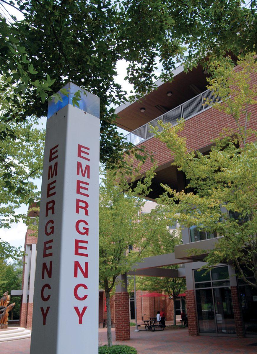 An emergency alert kiosk stands among the buildings of Wolf Village apartments on Wednesday, July 26. Three incidents of sexual assault were reported to NC State University Police on Friday, July 21. University Police sent out an official email to all of campus via WolfAlert the following Sunday, stating that the three incidents were perpetrated by male students whom the female survivors knew while they were at a party. The message also stated that University Police is continuing investigation of the reports.