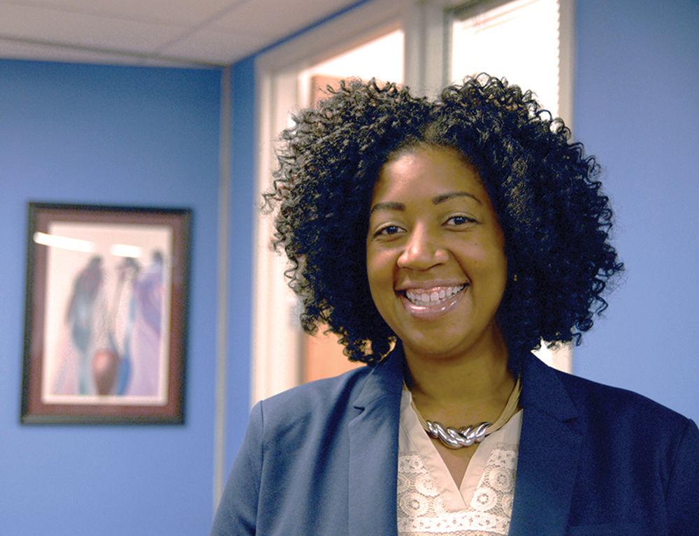 Nashia Whittenburg, director of Multicultural Student Affairs, stands in the office of Multicultural Student Affairs on Wednesday. Whittenburg stated that "Students love coming to the office" and she wished to preserve the openness of the office to students. She also stated that Diversity to her is "all-inclusive" and involves the many aspects that make people who they are.