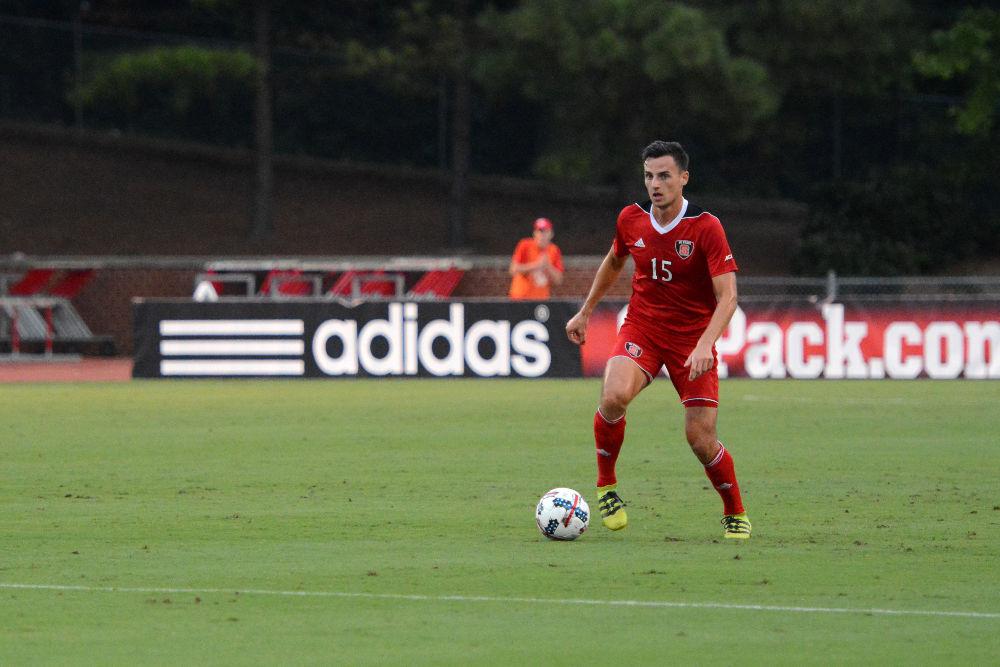 Senor midfielder Maximilian Luftl carries the ball upfield against Florida Atlantic. The Wolfpack won the game by a score of 3-2 in Dail Soccer Stadium on Friday Aug 25.