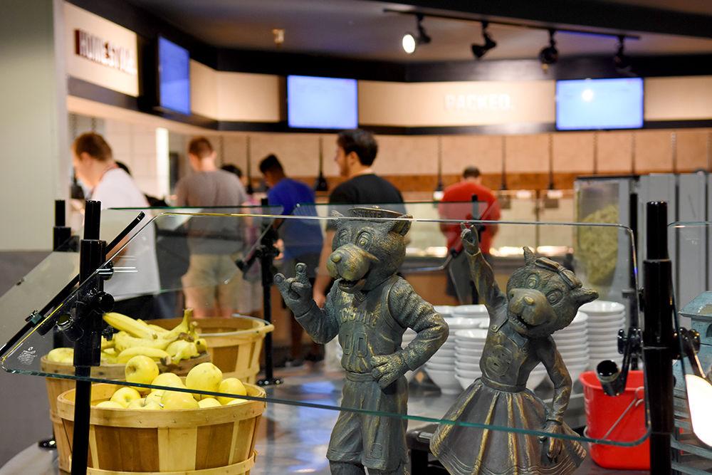 Mr. and Mrs. Wuf stand as fixtures in Fountain Dining Hall, the largest dining hall on campus.