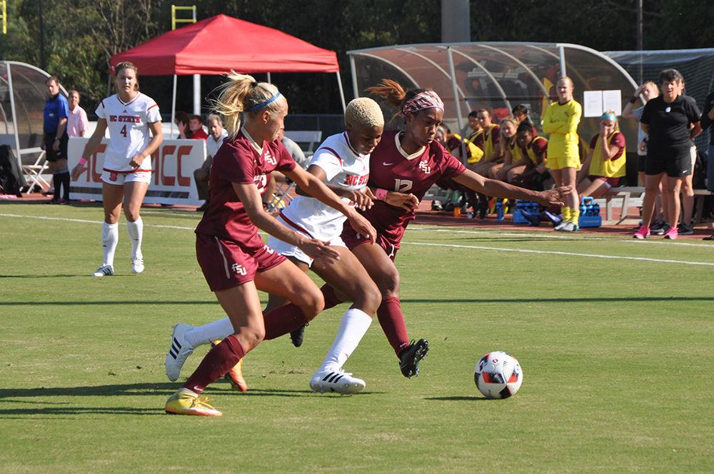 Freshman midfielder Tziarra King attempts to carry the ball up the field against Florida State. The Wolfpack lost to the Seminoles 1-0 in Dail Soccer Stadium Oct. 15.