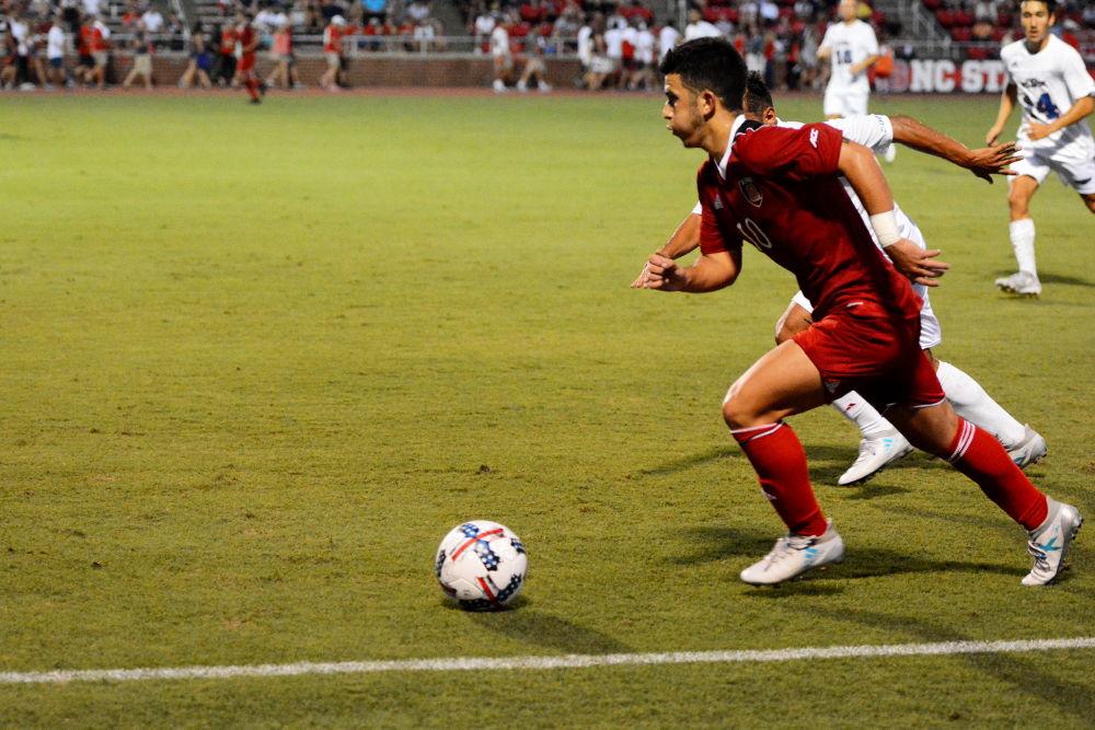 David Loera, a freshman chases down the ball against Florida Atlantic. NC State beat the Owls 3-2 in Dail Soccer Stadium on Friday Aug 25.