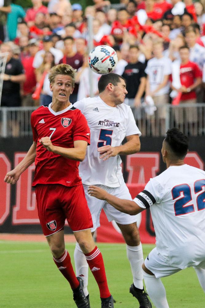 Junior forward Tanner Roberts heads the ball. Roberts had two shots on target with one goal during the 3-2 win over Florida Atlantic on Friday, Aug 25, in Dail Soccer Stadium.
