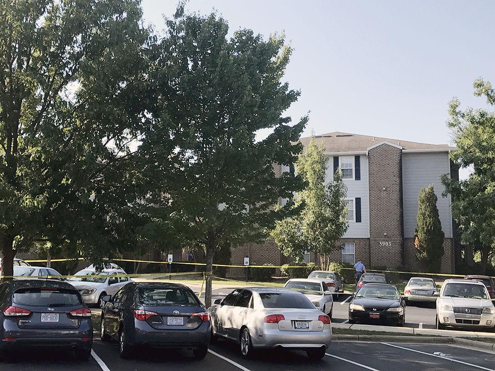 A police line blocks building 5903 at Vie Apartments. A shooting in the hallway left a 23 year-old man dead on Sunday, Aug. 27.&#160;