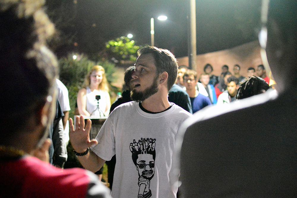 A frequent participant, Derek, espouses rhymes about social issues focusing on religion at the 7th anniversary meeting of Cypher on Monday, Aug. 28. He is among many who chose to express themselves to the crowd at the Free Expression Tunnel.