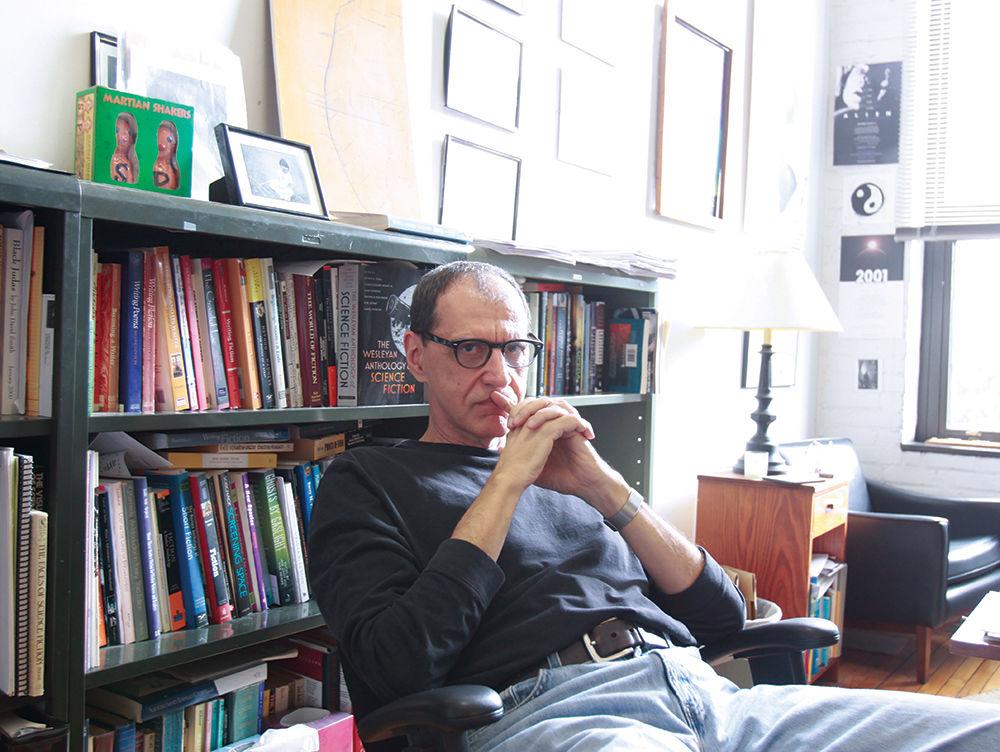John Kessel, author of &#8220;Corrupting Dr. Nice,&#8221; sits in his office in Tompkins Hall on Jan. 30, 2013. The award-winning professor teaches science fiction and fantasy for the English department. "I have many books from students that have gone through my classes and have gone on to be published," Kessel said.