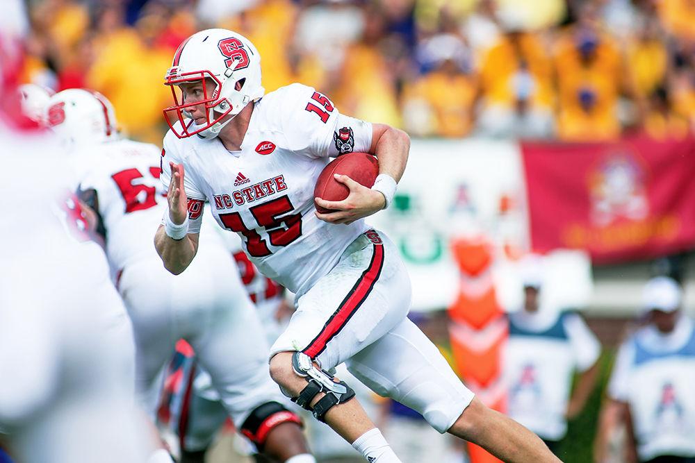 Redshirt sophomore quarterback Ryan Finley makes a quarterback rush during the Wolfpack loss to East Carolina 33-30 on Sept. 10, 2016, in Dowdy-Ficklen Stadium.