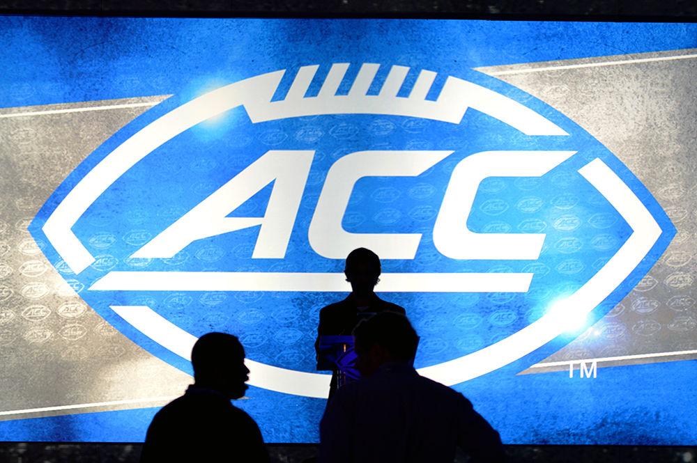 A man stands at the podium while visuals are changed in between press conferences at the ACC Kickoff. The 2017 ACC Kickoff took place at the Westin Hotel in Charlotte. Teams in the Atlantic Division held press conferences on Thursday, July 13 while teams in the Coastal Division held press conferences on Friday, July 14.