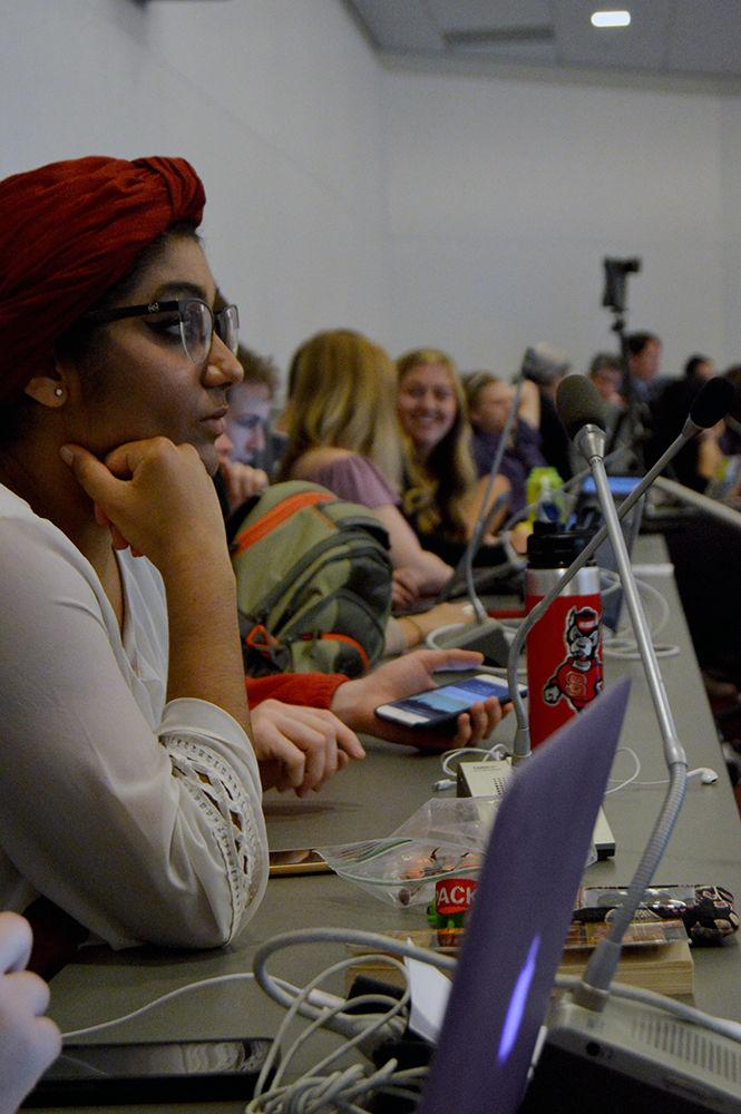 Fri Momin, director of philanthropy and service, gives her undivided attention to the Student Senate meeting in the Governance Chambers in Talley Student Union on Wednesday, Aug. 30.
