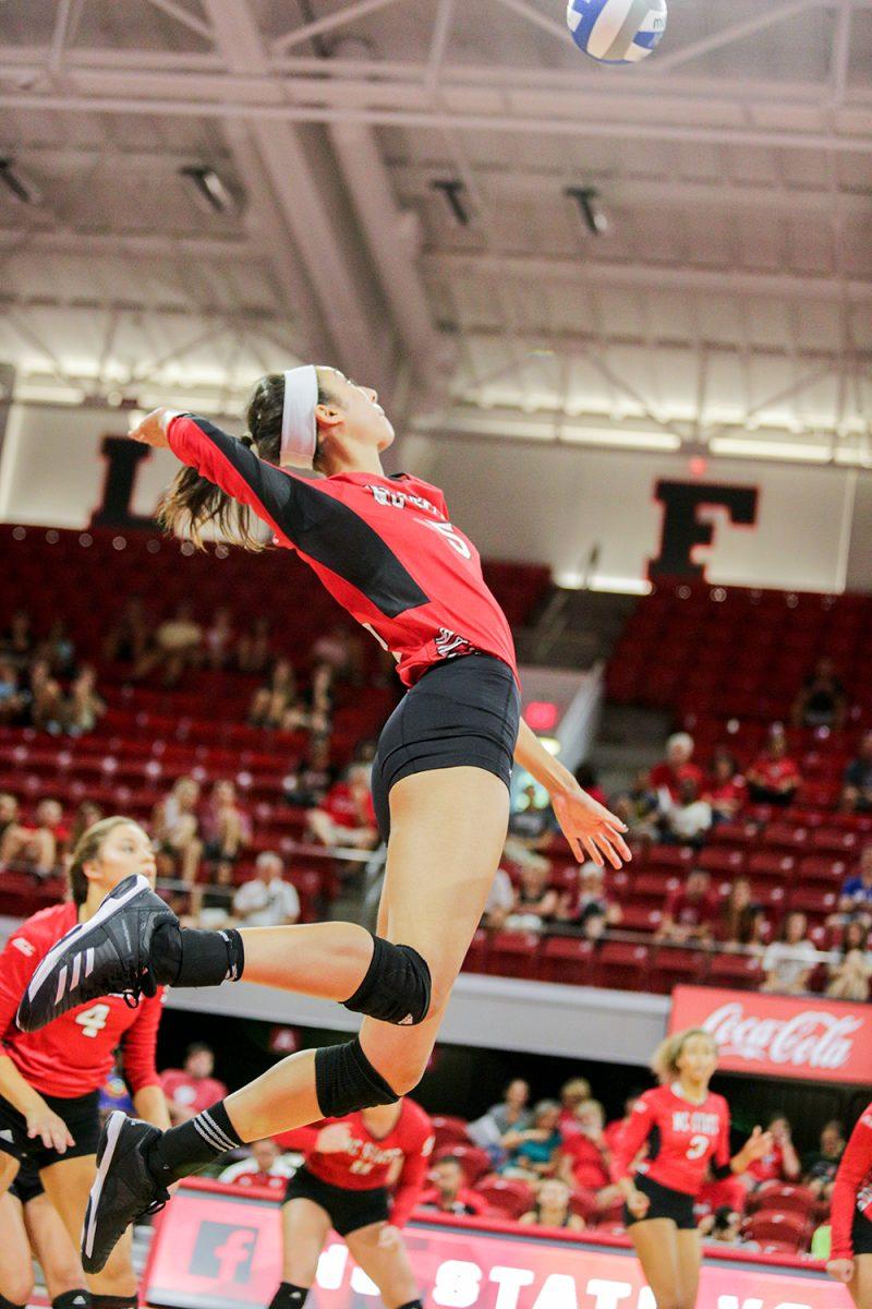 Graduate outside hitter Bree Bailey goes up for the kill during the Red and White Intrasquad Scrimmage on Saturday, Aug. 19 in Reynolds Coliseum.