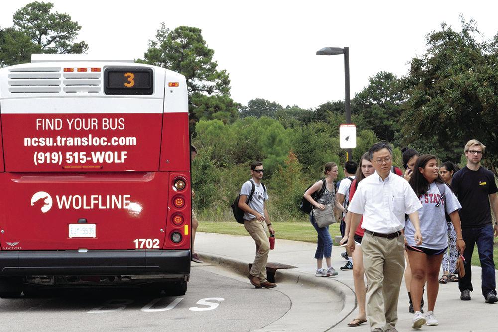 Wolfline passengers depart from the Engineering bus on Tuesday, August 22. The passengers were dropped off at the Engineering Building II and Oval Drive bus stop on Centennial Campus.