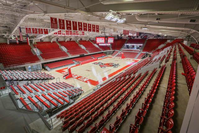 After renovation, the new court on Reynolds Coliseum features a large Mr. Wuf at center court and a brand new scoreboard along with new court-side seats. Reynolds will now hold just over 5,000 fans for games and about 6,000 for concerts.