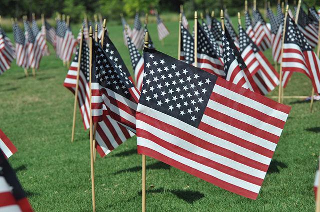 NC State's first 9/11 Memorial Ceremony and Run is held on Stafford Commons to honor those who lost their lives due to the attacks on Sept. 11, 2001. American flags formed a pentagon which surrounded the two towers and the numbers nine and three, which commemorated all of those on United Airlines Flight 93 who died in the attacks. Christopher Caporali, a senior studying meteorology, hoped this event would "inspire change in how we respond to acts of terrorism as a Pack, as a Raleigh community and as a country." Caporali, several on-campus organizations and local Raleigh fire and police departments gathered Saturday morning to celebrate the resilience of the American people 15 years later.