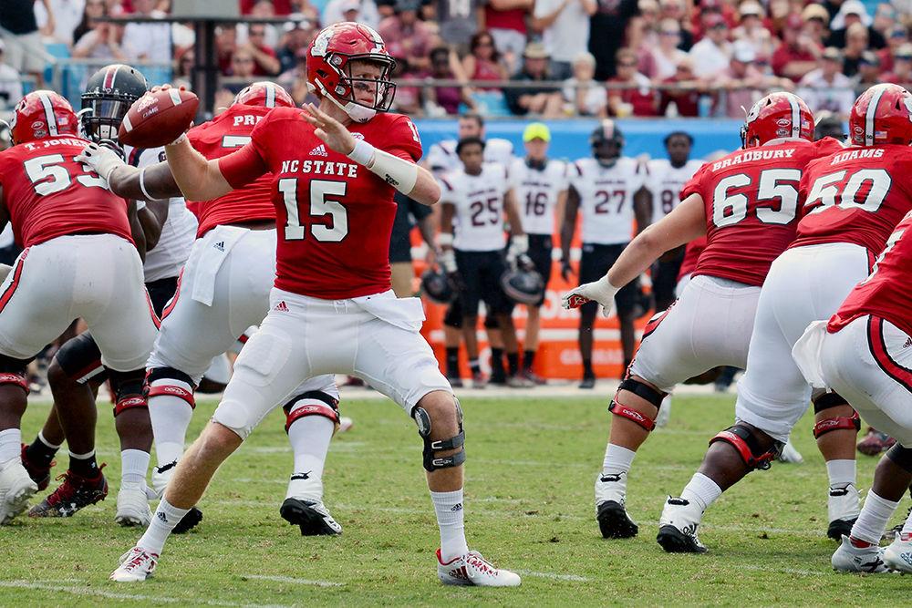 Redshirt Junior quarterback Ryan Finley winds up to throw during the game against the Gamecocks. Despite throwing for 415 yards, Finley and the Wolfpack lost the game by a score of 35-28. The game, which was attended by 50,367 fans was held in Bank of America Stadium in Charlotte, NC on Saturday, Sept 2.