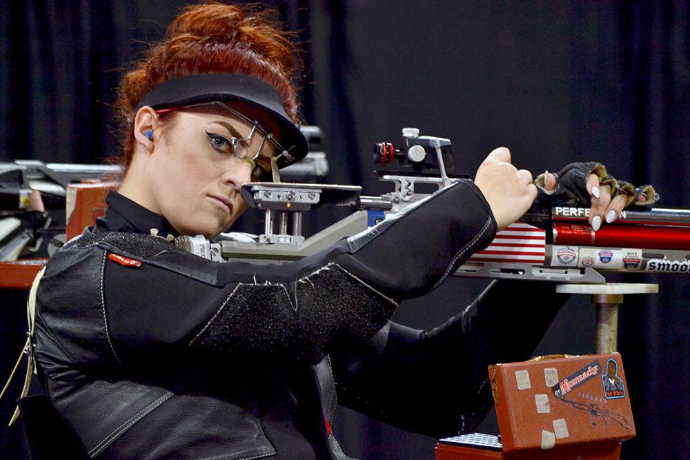 Lauren Phillips, a graduate student studying social work, reloads her air rifle during the individual air rifle elimination tournament during the NC State rifle match against West Virginia on Oct. 15 in Reynolds Coliseum. The Wolfpack lost to the Mountaineers during the tournament with a score of 15-21.