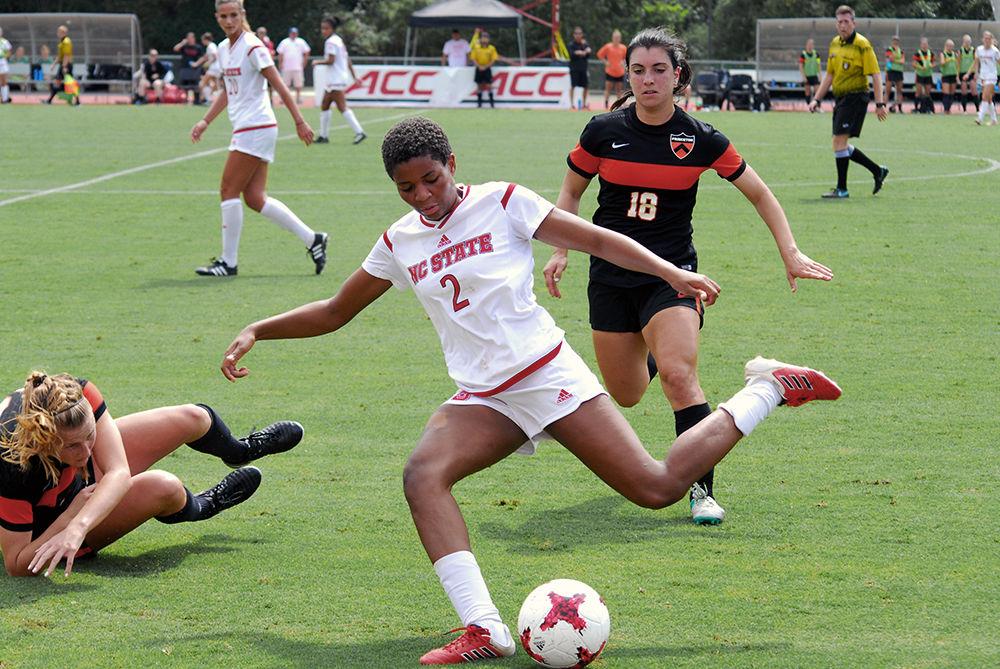 Sophomore midfielder Tziarra King kicks the ball downfield in Dail Soccer Stadium on Saturday. The Wolfpack lost 0-2 to the visitors from Princeton University after a postponement of the game the previous day due to inclement weather.