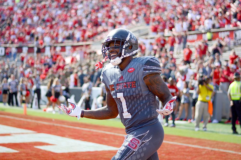 Senior H-back Jaylen Samuels celebrates a touchdown. The NC State football team beat Syracuse 33-25 at Carter-Finley Stadium on Saturday.