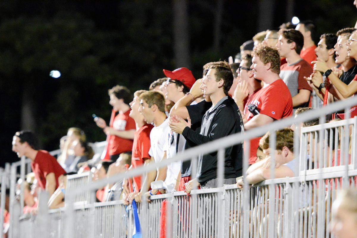 Fans cheer on the team from the stands. The NC State women's soccer team tied Virginia 0-0 in double overtime at Dail Soccer Stadium on Friday, Sep. 15.