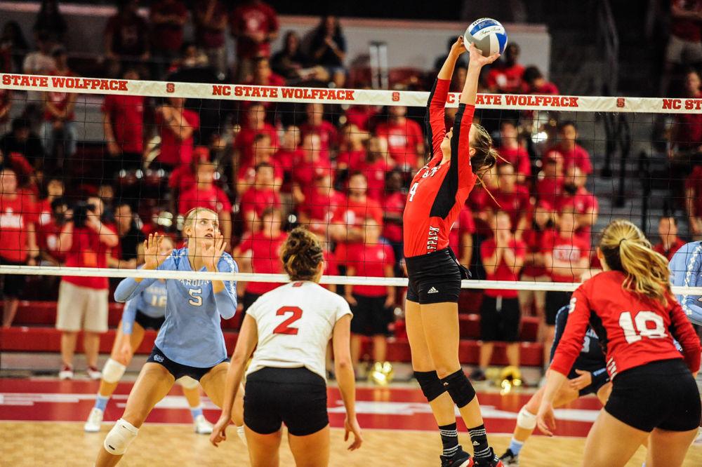 Junior setter Kylie Pickrell sets backward. The NC State Women&#8217;s Volleyball Team went on to defeat #11 UNC 3 - 2.