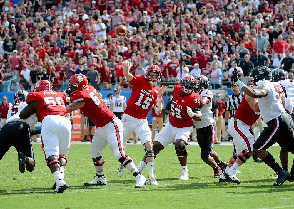 Redshirt Junior quarterback Ryan Finley fires a pass against the South Carolina Gamecocks. The Wolfpack would go on to lose the game by a score of 35-28. The game, which was attended by 50,367 fans was held in Bank of America Stadium in Charlotte Saturday.