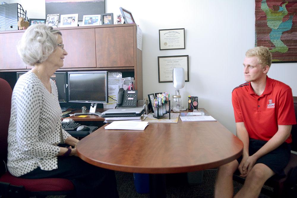 Sabina Vermeulen, access consultant with the Disability Services Office, talks with Jake Smith, a first-year student studying business administration, about the resources the DSO provides in Vermeulen&#8217;s office at the Student Health Center on Monday, Aug 28.&#160; According to Mark Newmiller, the director of the DSO, changes occurring this year include a new proctoring center in the First-Year College Commons building.&#160; "Previously, students had to go to different locations for testing accommodations,&#8221; Newmiller said. &#8220;In the future, we hope to encourage more faculty to utilize Universal Design for Learning principles in the design and delivery of their courses.&#8221;