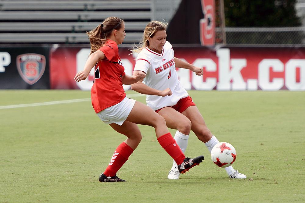 Junior defender Hanna Keogh shields the ball from a Davidson player. The NC State women's soccer team beat Davidson 4-0 at Dail Soccer Stadium on Sunday, Sept. 10.