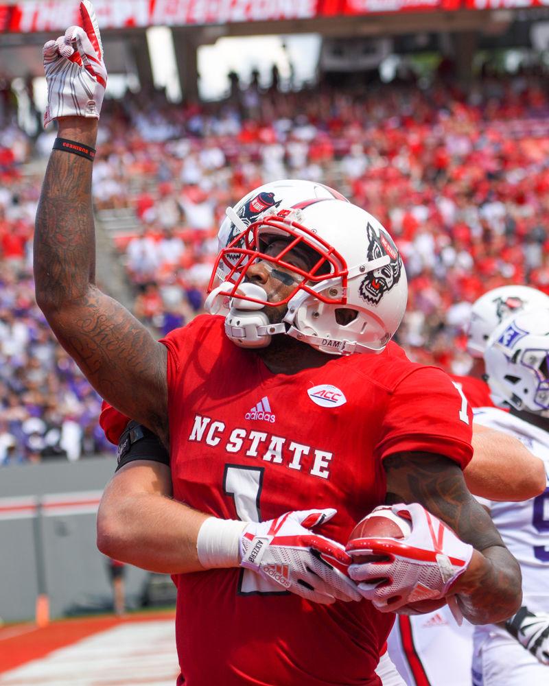 Senior H-back Jaylen Samuels celebrates scoring a touchdown. Samuels scored a total of three touchdowns throughout the game. The NC State Football team beat Furman 49-16 on Saturday, September 16th.