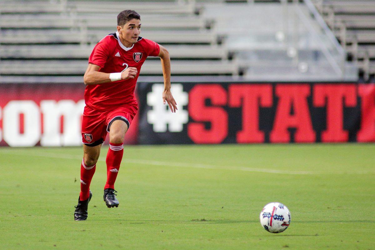 Freshman forward Manny Perez rushes the ball upfield. Perez had one shot for a goal during the 3-2 win over Florida Atlantic on Aug. 25 in Dail Soccer Stadium.